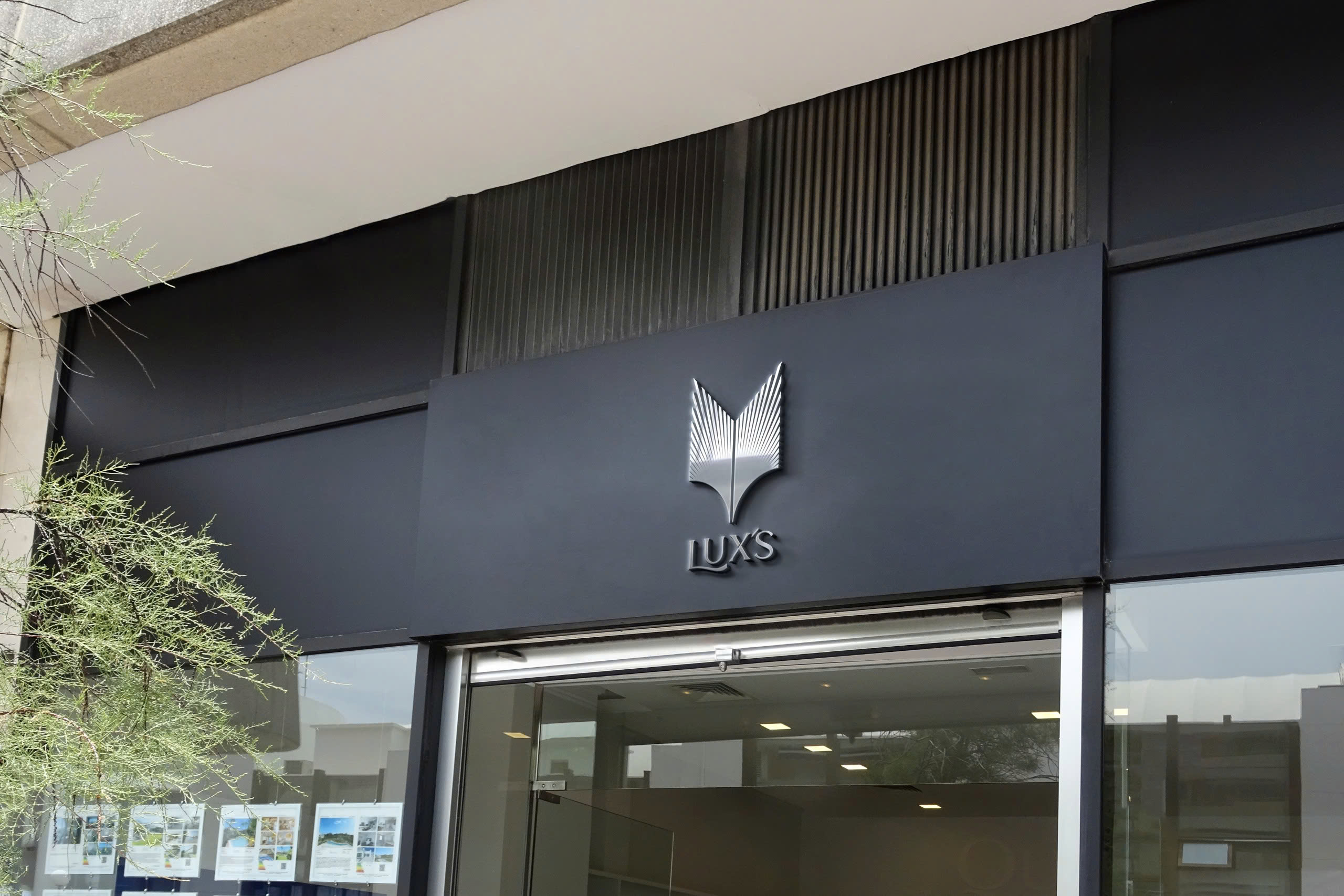 LUX'S exterior signage concept